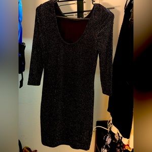 Black shimmering long sleeve dress.